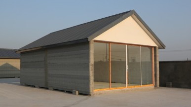 Constructed from recycled industrial wastes and cement, these houses are paving new ground (Image: Winsun New Materials)